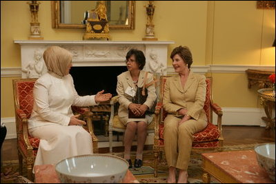 Mrs. Laura Bush visits with Mrs. Emine Erdogan, wife of Prime Minister Recep Tayyip Erdogan of Turkey , in the Yellow Oval Room in the private residence of the White House Monday, October 2, 2006.