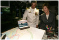 Mrs. Laura Bush and Captain John Litherland, Commanding Officer of the USS Texas submarine, pause in the control room of the submarine during a tour of the ship Saturday, September 9, 2006, in Galveston, Texas. Mrs. Bush later participated in the Commissioning Ceremony marking the entry of the vessel into the U.S. Atlantic Fleet.