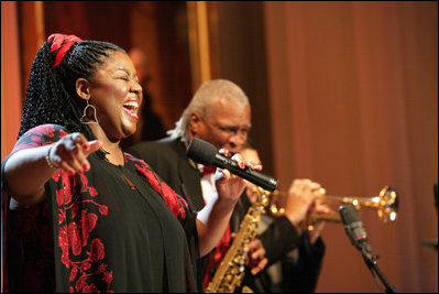 Jazz vocalist Lisa Henry and saxophonist Bobby Watson perform their version of "Kansas City" during the Thelonious Monk Institute of Jazz dinner Thursday night, Sept. 14, 2006, in the East Room of the White House.