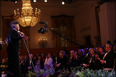 President George W. Bush and Mrs. Laura Bush listen as vocalist Anita Baker sings "My Funny Valentine" Thursday, Sept. 14, 2006, during an evening of festivities surrounding the Thelonious Monk Institute of Jazz dinner at the White House.