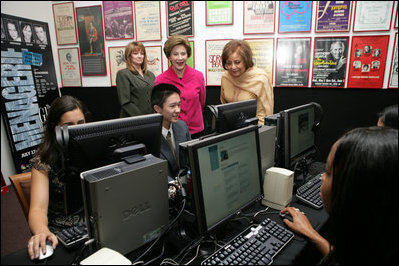 Mrs. Laura Bush and Mrs. Sehba Musharraf, wife of Pakistan's President Pervez Musharraf, right, watch a demonstration of the new cultural and arts website Thursday, Sept. 21, 2006, with students of Eleanor Roosevelt High School and teacher Elizabeth Putnam, far left, at The John F. Kennedy Center for the Performing Arts in Washington, D.C. The website is created by the Pakistan National Council the Arts and The Kennedy Center and is called, "Gift of the Indus: The Arts and Culture of Pakistan."