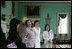 Mrs. Laura Bush and Mrs. Akie Abe, wife of Japanese Prime Minister Shinzo Abe, react to a humorous comment on their tour of the Mount Vernon Estate of George Washington Thursday, April 26, 2007, in Mount Vernon, Va.