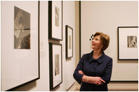 Mrs. Laura Bush views photographs Wednesday, Aug. 1, 2007, during her visit to the National Gallery of Art exhibit, FOTO: Modernity in Central Europe, 1918-1945. Mrs. Bush toured the exhibit with Mrs. Náda P. Simonyi, wife of Hungarian Ambassador András Simonyi.