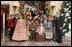 President George W. Bush and Mrs. Laura Bush pose for a photo with the Ford Theater cast members of "A Christmas Carol," following their performance Monday, Dec. 3, 2007, at the White House Children's Holiday Reception.