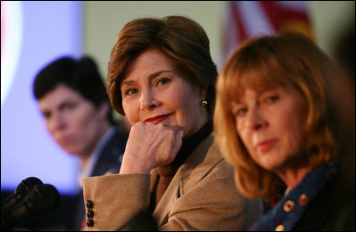Mrs. Laura Bush listens to panel members during her participation is a roundtable discussion on the special needs of military youth and families Wednesday, Dec. 5, 2007, at the Learning Center at Andrews Air Force Base in Maryland.