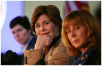 Mrs. Laura Bush listens to panel members during her participation is a roundtable discussion on the special needs of military youth and families Wednesday, Dec. 5, 2007, at the Learning Center at Andrews Air Force Base in Maryland.