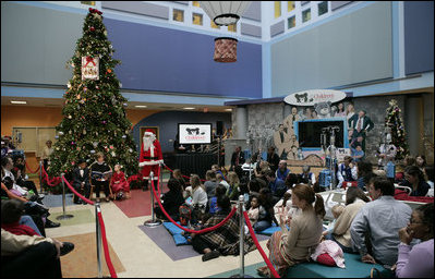 Mrs. Laura Bush reads "Rudolph the Red Nosed Reindeer" to children at the Children's National Medical Center in Washington, D.C., Wednesday, Dec. 12, 2007, following a tour of the Surgical Care Unit where she visted with young patients.