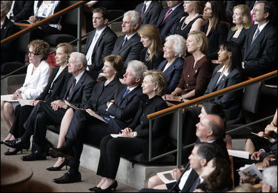 Mrs. Laura Bush, first row-center, joins former President Jimmy Carter and his wife, Rosalynn; former President Bill Clinton, and his wife, Hillary Clinton; Mrs. Nancy Reagan; Caroline Kennedy Schlossberg, her husband Edwin Schlossberg; Mrs. Barbara Bush; Susan Ford Bales, daughter of former President Gerald R. Ford; and Patricia "Tricia" Nixon Cox and her husband, Edward Cox, upper-right, at the funeral service for former first lady Lady Bird Johnson Saturday, July 14, 2007, at the Riverbend Centre in Austin, Texas. 