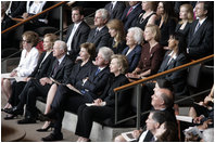 Mrs. Laura Bush, first row-center, joins former President Jimmy Carter and his wife, Rosalynn; former President Bill Clinton, and his wife, Hillary Clinton; Mrs. Nancy Reagan; Caroline Kennedy Schlossberg, her husband Edwin Schlossberg; Mrs. Barbara Bush; Susan Ford Bales, daughter of former President Gerald R. Ford; and Patricia "Tricia" Nixon Cox and her husband, Edward Cox, upper-right, at the funeral service for former first lady Lady Bird Johnson Saturday, July 14, 2007, at the Riverbend Centre in Austin, Texas. 