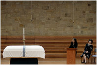 Luci Baines Johnson, left, and her sister, Lynda Bird Johnson Robb, offer remembrances of their mother, former first lady Lady Bird Johnson, during the funeral service Saturday, July 14, 2007, at the Riverbend Centre in Austin, Texas.