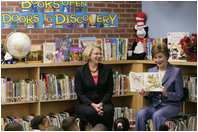 Mrs. Laura Bush, joined by U.S. Secretary of Education Margaret Spellings, reads to children at the Driggs School in Waterbury, Conn., Tuesday, July 24, 2007. Mrs. Bush also announced the 2007 Improving Literacy through School Libraries grants being awarded by the U.S. Department of Education. 