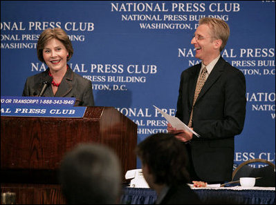 Mrs. Laura Bush participates in a question and answer session after addressing the National Press Club Wednesday, July 25, 2007 in Washington D.C. Mrs. Bush, joined by National Press Club President Jerry Zremski, talked about inspiring stories of what people are doing to help those with HIV/AIDS. "But certainly one of the most moving parts is the work that so many groups are doing on ground in Africa," said Mrs. Bush. "(Bruce Wilkinson, Director of the RAPIDS Consortium), have a donor who has given 23,000 bicycles to Zambia, so that the care-givers that we met can literally go door to door in their neighborhoods and find out who needs help."