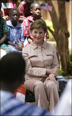 Mrs. Laura Bush visits with students and teachers at the Nelson Mandela Primary School Complex Friday, June 29, 2007, in Bamako, Mali. The United States is partnering with African nations in the Africa Education Initiative, a $600 million dollar investment that will provide 550,000 scholarships to African children and train more than 900,000 teachers by 2010.