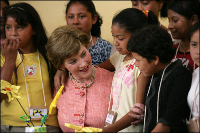 Mrs. Laura Bush talks to children at Camino Seguro (Safe Passage) in Guatemala City, Guatemala, Monday, March 12, 2007.