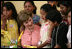 Mrs. Laura Bush talks to children at Camino Seguro (Safe Passage) in Guatemala City, Guatemala, Monday, March 12, 2007.
