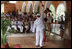 Mrs. Laura Bush and Mrs. Margarita Zavala, wife of Mexico President Felipe Calderon, applaud a performer of the Cultural Center for Yucatecan Children Tuesday, March 13, 2007, at Hacienda Ochil near Temozon in Mexico.