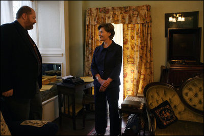 Mrs. Laura Bush listens as Russell Caldwell, manager of visitor services, conducts a tour of the Margaret Mitchell House and Museum, Thursday, Nov. 1, 2007 in Atlanta, Ga. It was in this house that Mitchell wrote the novel, Gone with the Wind.