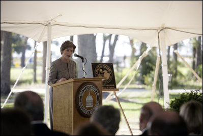 Mrs. Laura Bush delivers remarks during the announcement of the Coastal Ecosystem Learning Center Designation and Marine Debris Initiative at the University of Southern Mississippi in Ocean Springs, Miss. Said Mrs. Bush, "Whether we live on the shore or not, all of us have the obligation to care for these amazing natural resources."