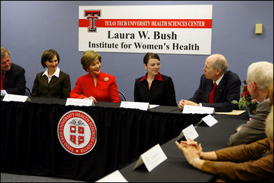 Mrs. Laura Bush listens to Chancellor Kent Hance during a roundtable discussion with members of Texas Tech University, TTU Health and Science Center, and the Laura W. Bush Institute for Women's Health Wednesday, Nov. 7, 2007, in Amarillo, Texas. Mrs. Bush is sitting with, from left, Dr. John Baldwin, Erin Thurston, and Dr. Marjorie Jenkins.