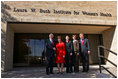 Mrs. Bush shakes hands with Chancellor Kent Hance, Texas Tech University System, as she stands with Dr. Marjorie Jenkins, Erin Thurston and Dr. John Baldwin in front of the Laura W. Bush Institute for Women's Health at TTU, Amarillo Campus Wednesday, Nov. 7, 2007, in Amarillo, Texas.