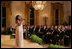 President George W. Bush, Mrs. Laura Bush and guests listen to singer Melinda Doolittle perform Tuesday evening, Nov. 13, 2007 in the East Room of the White House, during a social dinner in honor of America's Promise-The Alliance for Youth. 
