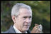 President George W. Bush holds a screech owl Saturday, Oct. 20, 2007 at the Patuxent Research Refuge in Laurel, Md., where President Bush discussed steps his Administration is creating for a series of cooperative conservation steps to preserve and restore critical stopover habitat for migratory birds in the United States.