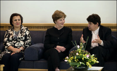 Mrs. Laura Bush speaks with Dr. Rasha al-Sabah, right, Under Secretary of the Ministry of Higher Education, during a Diwaniya held by political women leaders Wednesday, Oct. 24, 2007, in Kuwait City, Kuwait. Also pictured is the Minister of Education Dr. Nouriyah Al-Sabih.