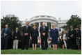 President George W. Bush, Mrs. Laura Bush, Vice President Dick Cheney and Mrs. Lynne Cheney bow their heads for a moment of silence on the South Lawn of the White House Tuesday, Sept. 11, 2007, in memory of those whose lives were lost on Sept. 11, 2001.