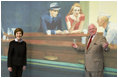 Mrs. Laura Bush stands with Rusty Powell III, Director of the National Gallery of Art, before entering an exhibit of paintings by American artist Edward Hopper Friday, Sept. 21, 2007, in Washington, D.C. The exhibit opened Sept. 16 and runs through Jan. 21, 2008. Pictured in the banner behind Mrs. Bush is Mr. Hopper's 1942 painting Nighthawks.
