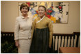Mrs. Laura Bush meets with Madam Yoo (Ban) Soon-taek, wife of United Nations Secretary General Ban Ki-moon, during a UN-hosted tea Tuesday, Sept. 25, 2007 in New York City.