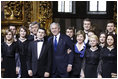 President George W. Bush and Mrs. Laura Bush pose for a photo with Ukrainian President Viktor Yushchenko and the Credo Chamber Choir Tuesday, April 1, 2008, after a musical performance at St. Sophia's Cathedral in Kyiv, Ukraine.
