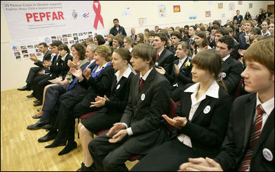 President George W. Bush and Mrs. Laura Bush applaud as they watch a skit sponsored by PEPFAR on HIV/AIDS performed by students at School 57 Tuesday, April 1, 2008, in Kyiv, Ukraine.
