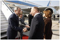President George W. Bush and Mrs. Laura Bush are greeted upon arrival Wednesday, April 2, 2008, by President Traian Basescu of Romania and Mrs. Maria Basescu at Mihail Kogalniceanu Airport in Constanta, Romania.