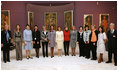 Mrs. Laura Bush poses for a photo with other NATO Spouses' during a visit to the National Art Museum Thursday, March 3, 2008, in Bucharest.