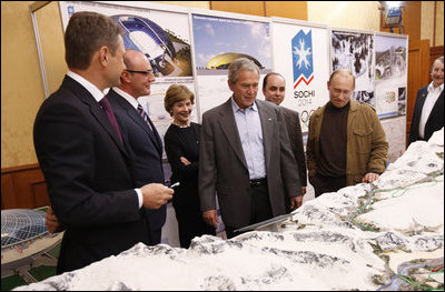President George W. Bush and Mrs. Laura Bush are briefed by President-elect Dmitriy Medvedev, left, on the 2014 Winter Olympics in Sochi during their visit Saturday, April 5, 2008, to President Vladimir Putin's summer retreat in Sochi, Russia.