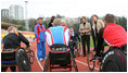 Mrs. Laura Bush visits with members of the Russian Paralympic Team Sunday, April 6, 2008, during a visit to Central Sochi Stadium in Sochi, Russia.