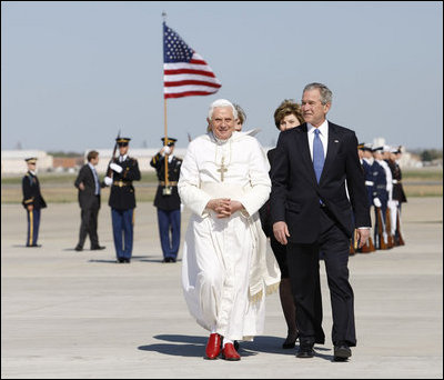 President George W. Bush, Mrs. Laura Bush and daughter, Jenna Bush, walk with Pope Benedict XVI after the Pontiff's arrival Tuesday, April 15, 2008, at Andrews Air Force Base, Maryland.