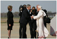 President George W. Bush and Laura Bush greet Pope Benedict XVI on his arrival to Andrews Air Force Base, Md., Tuesday, April 15, 2008, the first stop of a six-day visit to the United States.