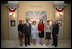Mrs. Bush poses for a photo during a tour of the Smithsonian American Art Museum's Exhibit "To Honor of Your Company Is Requested: President Lincoln's Inaugural Ball" Thursday, April 17, 2008, in Washington, D.C. Mrs. Bush is joined by, from left to right, Ms. Alison McNally, Acting Under Secretary for Finance and Administration, Smithsonian Institute, Dr. Richard Kurin, Acting Under Secretary for History, Art and Culture, Smithsonian Institute, Mrs. Sarah Brown, wife of Prime Minister of the United Kingdom, Lady Sheinwald, wife of the British Ambassador to the United States, and Mr. Charles Robertson, Guest Curator, "the Honor of Your Company Is Requested: President Lincoln's Inaugural Ball" Exhibit.