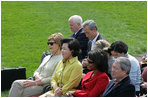 Mrs. Laura Bush joined by Mrs. Kim Yoon-ok, wife of the South Korean President Lee Myung-bak, U.S. Secretary of State Condoleezza Rice, and U.S. Defense Secretary Robert Gates listen during a joint press availability with President George W. Bush and South Korean President Lee Myung-bak Saturday, April 19, 2008, at the Presidential retreat at Camp David, Md.
