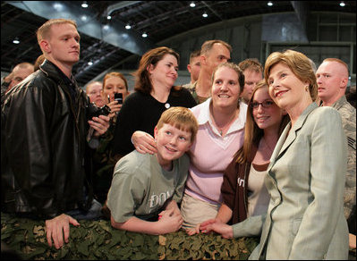 Mrs. Laura Bush joins members of the audience for photos Monday, Aug. 4, 2008, after remarks by President George W. Bush at Eielson Air Force Base, Alaska.