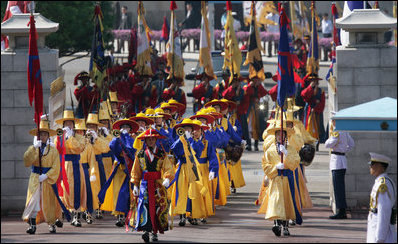 Ceremonial dancers arrive at the Blue House, the residence of President Lee Myung-bak of the Republic of Korea, for the arrival ceremonies Wednesday, Aug. 6, 2008, in Seoul for President George W. Bush and Mrs. Laura Bush.