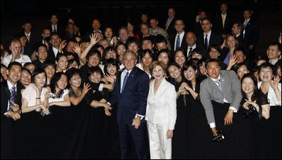 President George W. Bush and Mrs. Laura Bush pose for a photo during their visit with United States Embassy personnel and family members Wednesday, August 6, 2008, in Seoul.
