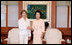 Mrs. Laura Bush meets with Mrs. Kim Yoon-ok, wife of the President of the Republic of Korea, during a coffee in Seoul on August 6, 2008.
