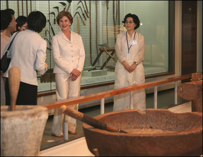 Mrs. Laura Bush tours the National Folk Museum of Korea in Seoul during her August 6, 2008 visit to Korea. The tour is led by Ms Yi, Ki Won, right, Deputy Director of Cultural Exchange and Education at the museum.