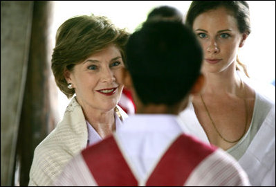 Mrs. Laura Bush and daughter Ms. Barbara Bush, right, visit a grammar class at the Mae La Refugee Camp at Mae Sot, Thailand, on August 7, 2008. At least 39,000 Burmese have gathered at this camp to escape oppression in their country. The camp is the largest of nine refugee camps in Thailand.