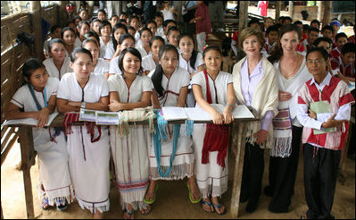 During her visit to the Mae La Refugee Camp in Mae Sot, Thailand, Mrs. Laura Bush visits with a class studying grammar. Mrs. Bush's daughter, Ms. Barbara Bush is to the right of Mrs. Bush in the Aug. 7, 2008 visit. The camp, the largest of nine on the border, houses at least 39,000 refugees fleeing the oppression in Burma.