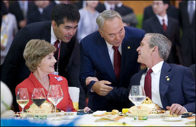 President George W. Bush greets President Nursultan Nazabayev of Kazakhstan Friday, Aug. 8, 2008, during a social luncheon in Beijing honoring the 2008 Olympic Summer Games.