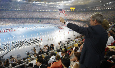 President George W. Bush and Mrs. Laura Bush acknowledge the entrance of the U.S. athletes into China's National Stadium in Beijing, Friday, Aug. 8, 2008, for the Opening Ceremonies of the 2008 Summer Olympics. The President called the event "spectacular and lots of fun."