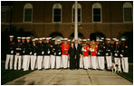 President George W. Bush and Laura Bush pose for a photograph with participants of the Evening Parade at the Marine Barracks Friday, August 29, 2008, in Washington D.C.